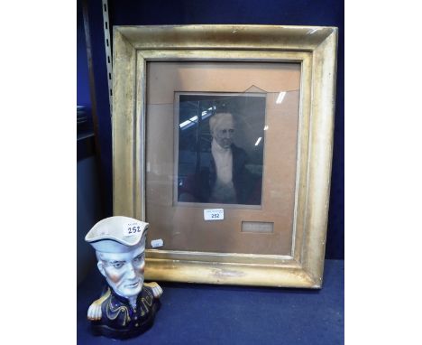 A STAFFORDSHIRE TYPE JUG of Wellingon and a similar framed print