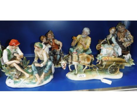 FIVE CAPO-DI-MONTE STYLE FIGURE GROUPS including two boys playing cards and others