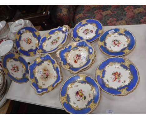 A VICTORIAN PART TEA SERVICE with painted floral decoration, within gilt and blue borders