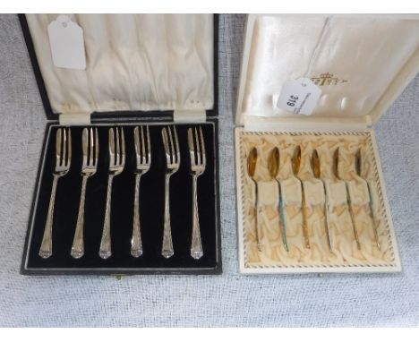 A SET OF SIX SILVER PASTRY FORKS and a set of six Sterling Silver coffee spoons with enamel handles (2)