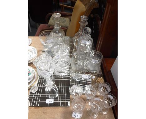 A GEORGIAN CUT-GLASS RUMMER, a Georgian cut-glass decanter and other glassware and mirrored placemats