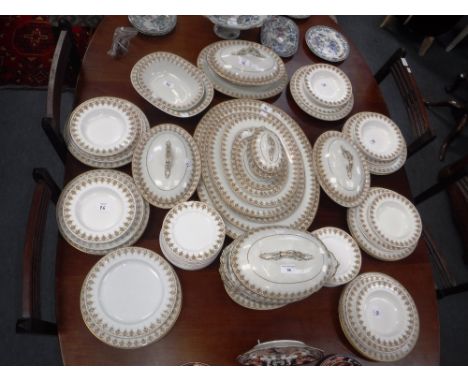 A ROYAL WORCESTER PORCELAIN DINNER SERVICE with transfer printed floral decoration on cream ground