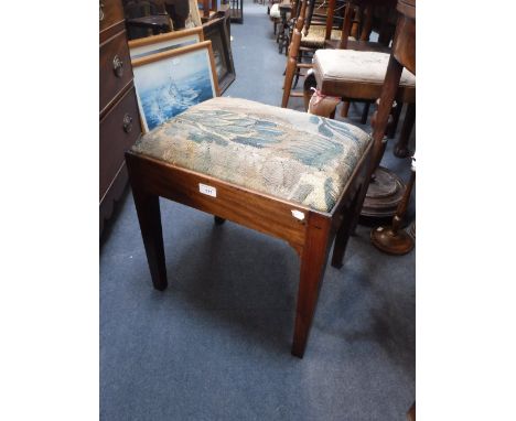 A GEORGE III MAHOGANY STOOL with a tapestry drop-in seat, 18" wide