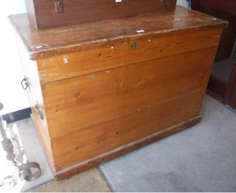 A LARGE VICTORIAN STRIPPED PINE TRUNK, 32" high x 45.5" wide