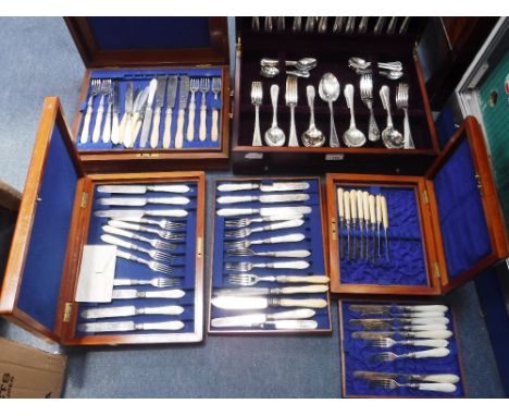 A COLLECTION OF CASED SETS OF CUTLERY including mother-of-pearl handled fruit knives and others