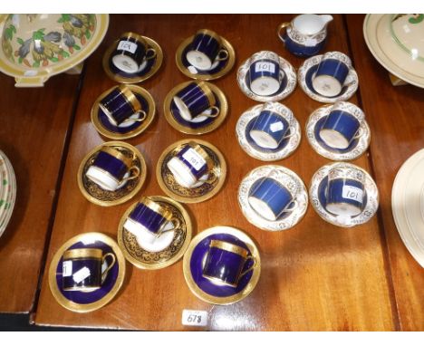 A SET OF SIX AYNSLEY COFFEE CUPS AND SAUCERS, three others similar and one other set of Spode coffee cups and saucers with ma