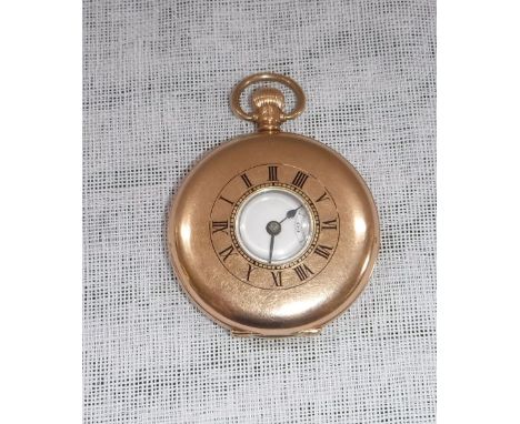 OMEGA: A GENTLEMAN'S 9CT YELLOW GOLD HALF HUNTING CASED POCKET WATCH, the white enamel dial with Arabic numerals and subsidia