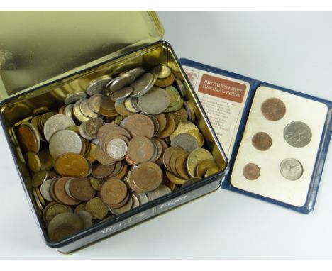 A tin of various pre-decimal coinage together with a Britain's First Decimal Coins pack