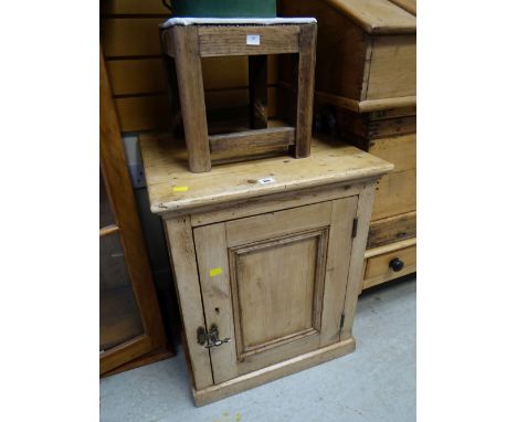 A small pine pot cupboard together with a stool