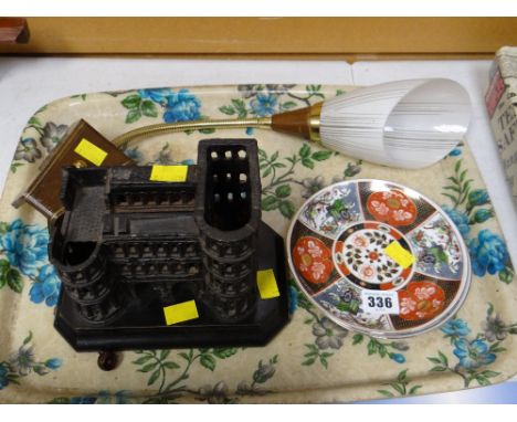 A cast metal model of a castle, vintage wall light etc