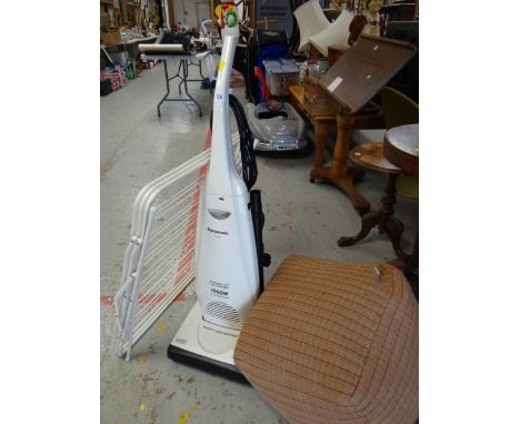 A Panasonic upright vacuum cleaner, clothes dryer & pouffe E/T