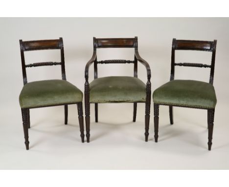 A set of 5 (4+1) Regency mahogany bar back dining chairs, each with a rope twist bar back, later upholstered overstuffed seat