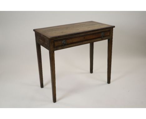 A George III oak and mahogany crossbanded side table with frieze drawer and lion mask ring handles on square tapering legs, 8