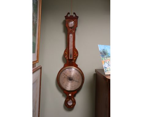 A Spelzini, London, a painted satinwood wheel barometer the broken swan neck pediment above a hygrometer, thermometer and 10'