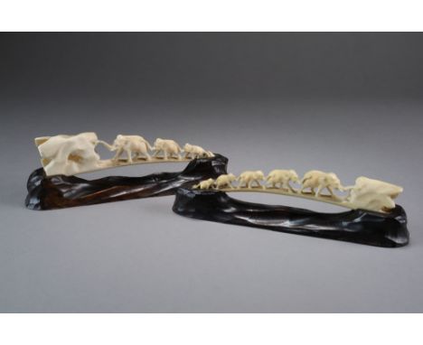 Two similar Japanese ivory elephant bridges, Meiji period, the first with a graduated family of five elephants the second wit