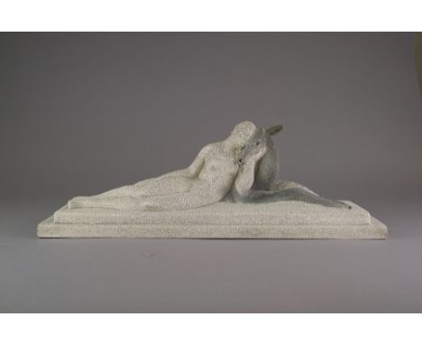 A French Sevres Vinsare slip cast pottery model of an Art Deco style naked lady and faun 57cm long, 20cm high