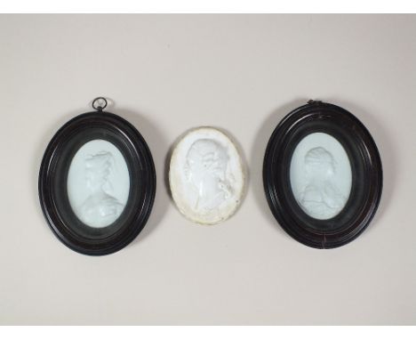 A collection of three late 18th century milk glass cameos, the first inscribed 'Charles grandson of James the II Born at Rome