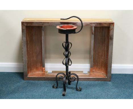 A Victorian stained beech toilet mirror, 40cm wide, an Art Deco style copper fronted fire surround, 86cm wide and a ceramic a