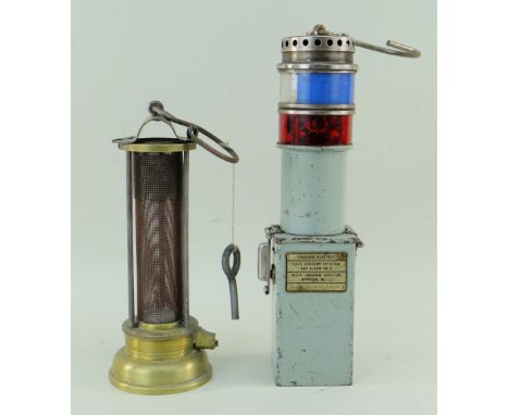 TWO VINTAGE MINERS LAMPS, comprising a simple brass and mesh Davey lamp and an English Electric Co. Ltd. Auto Firedamp Detect