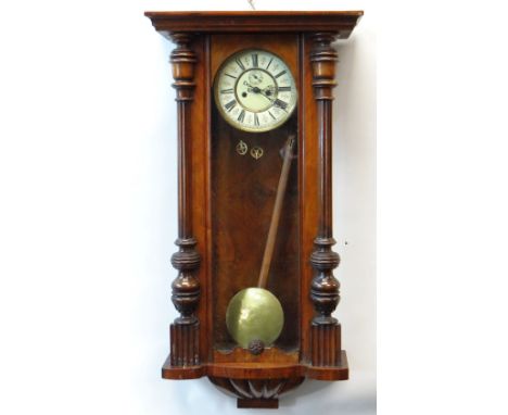 VIENNA-TYPE WALNUT WALL CLOCK, with two part enamel dial with Roman numerals and subsidiary seconds, two-train weight driven 