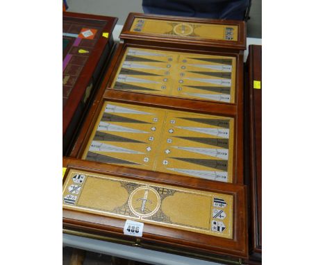 FRANKLIN MINT EXCALIBUR BACKGAMMON SET, a walnut case with inset simulated leather playing surface drawers and metal counters