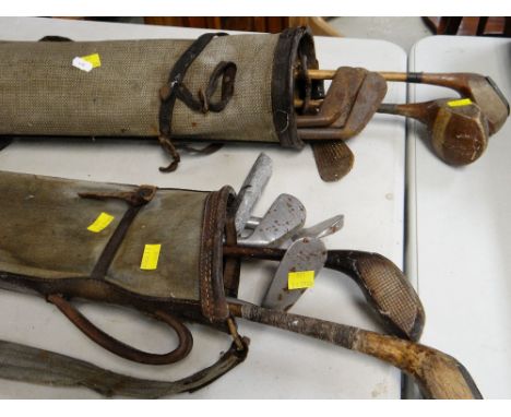 TWO VINTAGE GOLF BAGS containing assortment of woods and irons