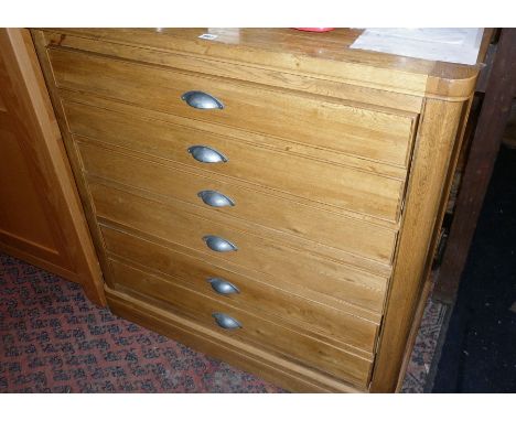 Light oak secretaire chest of five drawers with cup handles