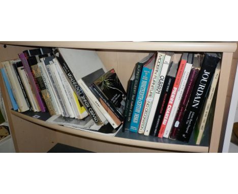 Shelf of books on late 19thc. and 20thc. designs and designers