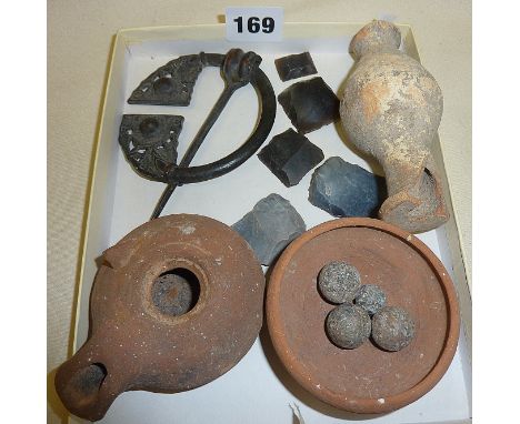 Antiquity earthenware lamp, large Celtic style brooch, musket balls, worked flint pieces, etc.