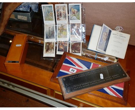 Cribbage board, Dominoes, snooker cue, framed Naval Flag and 'All about Ships and Shipping handbook and 22 'Pilgrims Progress