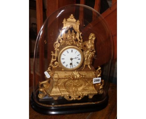 19th c. French gilt mantle clock, under dome, surmounted by figure of a girl directing a play with model theatre, 41cm tall