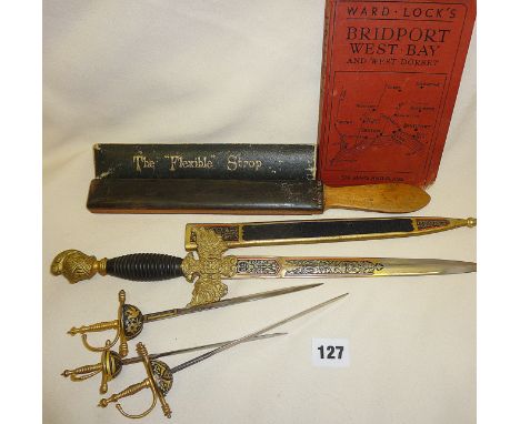 Spanish Toledo sword and letter openers, antique cut throat razor strop, and a map and guide book by Ward Lock &amp; Co. for 