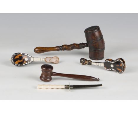 A 19th century treen gavel, the substantial head on a sectional handle, length 22cm, together with a 19th century rosewood ga