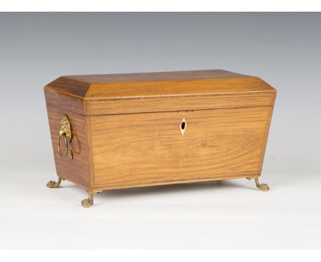 A Regency satinwood tea caddy with tulipwood crossbanding and boxwood stringing, raised on gilt metal claw and ball feet, wid