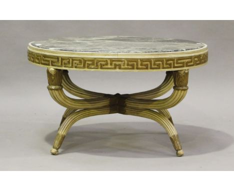 An early 20th century Neoclassical style white painted and gilt marble-topped circular lamp table, raised on a reeded 'X' fra