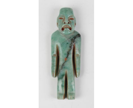 A pre-Columbian Olmec style carved apple green jade figure of a standing male, probably 900-450 BC, height 9.8cm. Provenance: