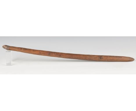An Australian aboriginal digging stick with overall textured shaft, length 71.5cm.Buyer’s Premium 29.4% (including VAT @ 20%)