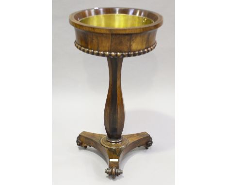 A William IV rosewood jardinière table, the interior fitted with a brass pan, the tapering sides with a heavy beaded edge, ra