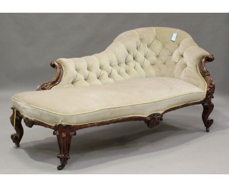 A mid-Victorian mahogany partial showframe chaise-longue, upholstered in buttoned velour, the two arms and cabriole legs fine