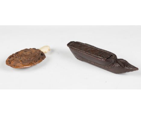 A late 18th/19th century carved coquilla nut miniature flask, finely carved with a recumbent dog beside a tomb, length 7cm, t