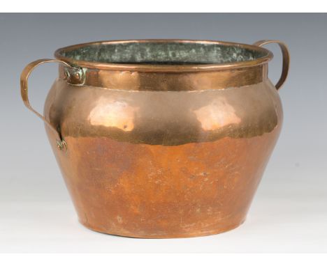 An early 20th century copper jardinière with scroll handles, height 26cm, width 46cm, together with a copper jug, height 29cm