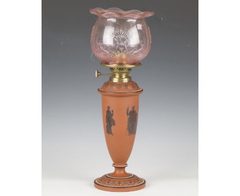A late Victorian Neoclassical Revival terracotta Young's Patent oil lamp by Hinks &amp; Son, fitted with a later pink glass s