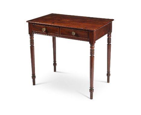 A Regency mahogany centre table
The rectangular top above two frieze drawers, with two simulated opposing drawers, on ring tu