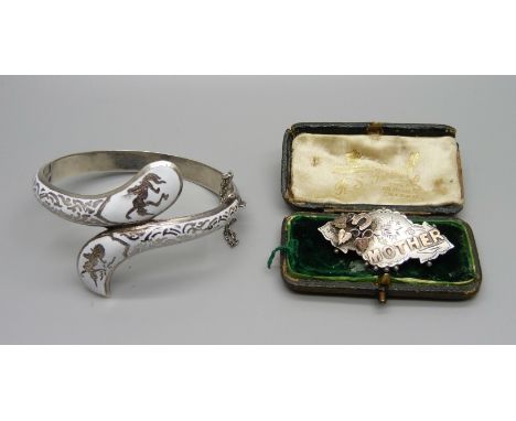 A Victorian silver 'Mother' brooch and a Siam silver snake bangle, 23g
