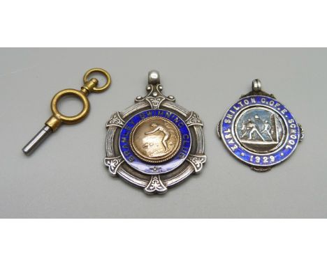 Two silver and enamel sporting fobs, etc. 