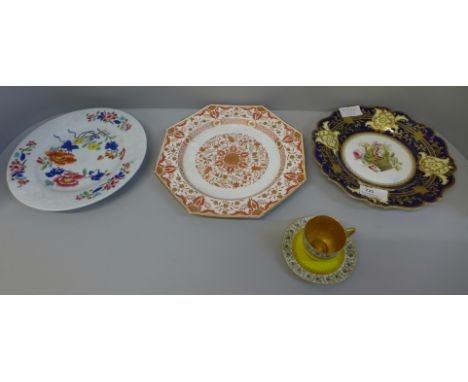 An early 19th Century English cabinet plate on a cobalt blue ground with gilt border and a central painting of a basket of fl