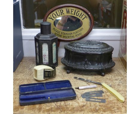 A Japanese metal tea caddy, a spelter casket, a/f, a razor, a slide viewer with Nottingham Forest 1959 FA Cup Final win and a