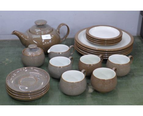 A Denby tea set including a teapot, milk jug, sugar bowl, five cups, four saucers, four side plates and five dinner plates 