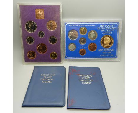 A 1970 proof eight coin set, a 1985 85th Queen Mother eight coin set and two first decimal coin sets 