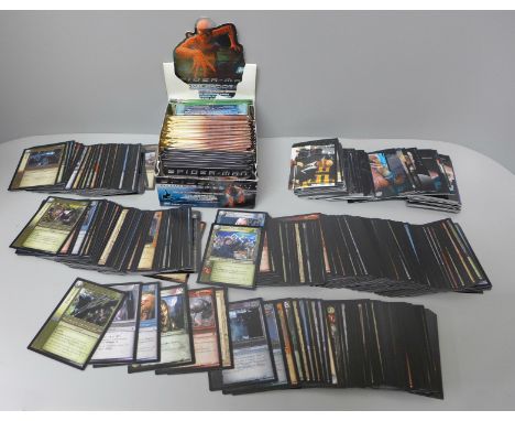 A collection of mixed trading cards including Spiderman, Scorpion King, football and a collection of loose Lord of the Rings 